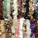 100 pc assortment of gemstone chip bracelets on elastic.