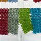 10 pc. pack of assorted color wide woven glass bracelet.