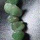 18" choker of approximately 10mm chunky style Aventurine chips with lobster claw clasp and 1.5" adjustable chain. 