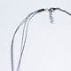 12 piece bag of 18" silver foil string chokers with lobster clasp and 1" extender.
