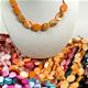 100 pc assortment of assorted shape dyed shell choker.  17" long with magnetic clasp.