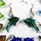 10 pair pack of assorted foil glass dolphin earrings.