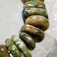 Gemstone irregular heishi elastic bracelet. Approximately  4 x 12mm