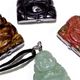 10 pc bag of assorted 25mm gemstone buddhas on cord.
