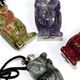 10 pc bag of assorted 25mm gemstone owls on cord.