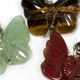 10 pc bag of assorted 25mm gemstone butterflies an cord.