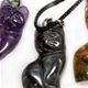 10 pc bag of assorted 25mm gemstone cats on cord.