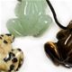 10 pc bag of assorted 25mm gemstone frogs on cord.