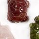10 pc bag of assorted 25mm gemstone turtles on cord.