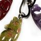 10 pc bag of assorted 25mm gemstone coyotes on cord.