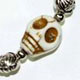 10 piece bag of natural colored magnesite skull anklets with spacer beads. Skull bead is approximately 10mm.