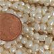 100 strand bag of freshwater pearls. Appx 15"