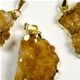 25 piece sheet of gold plated citrine druze pendants. approx 20 - 30mm