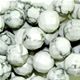 16" strand of faceted 10mm round white howlite beads.