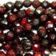 16" strand of faceted 6mm round black brecciated jasper beads.
