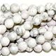 16" strand of faceted 6mm round white howlite beads.