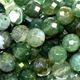 16" strand of faceted 8mm round green moss agate beads.