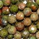 16" strand of faceted 8mm round unakite beads.